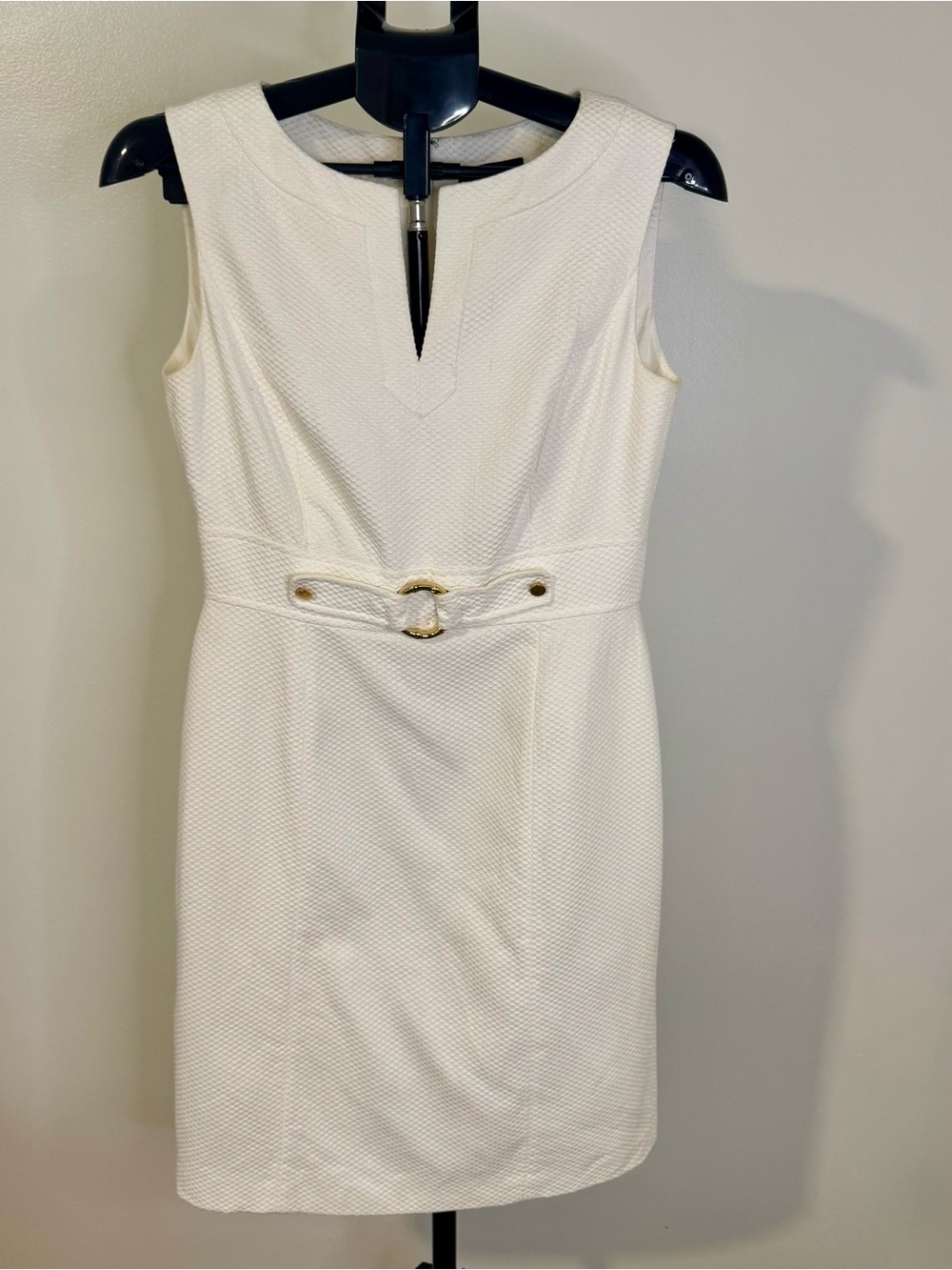 Classic Sleeveless White Dress with Gold Accent